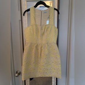 Formal dress with hello, gold, and cream floral pattern